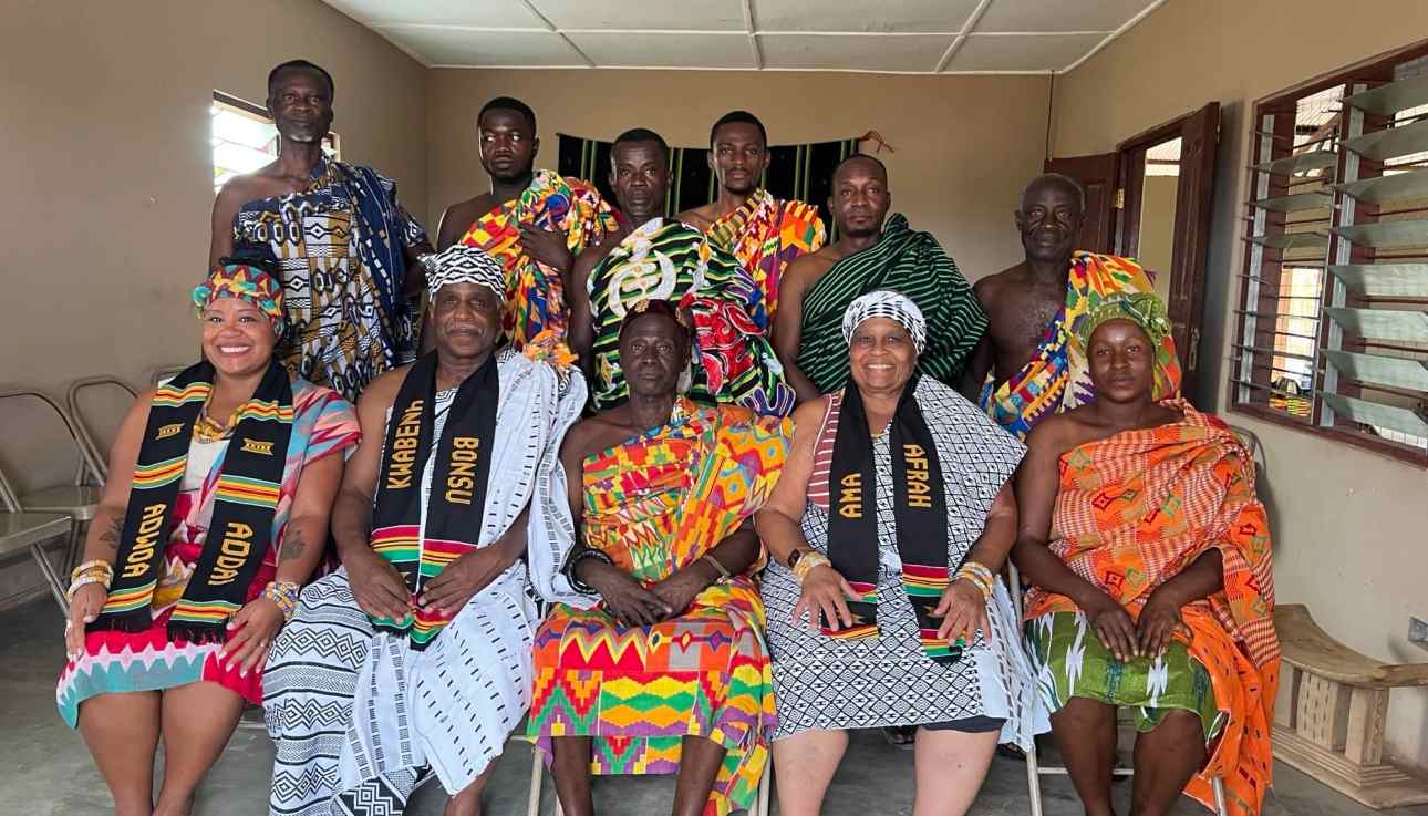 Vibrant group of Ghanaian chiefs and elders in traditional attire during cultural event at Timeh Tours.