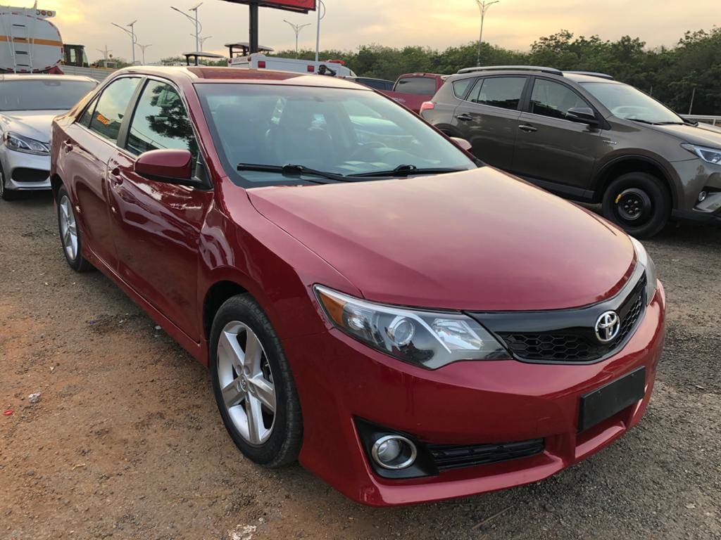 Front view of Toyota Camry sedan available for private tours and transfers with Timeh Tours